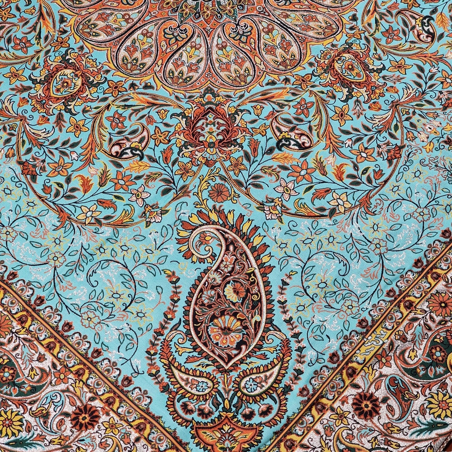 Lujoso mantel decorativo "termeh" con diseño Afshar sobre un fondo turquesa, un regalo exclusivo del arte persa para el Nowruz.